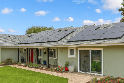 House a house with solar panels on the roof